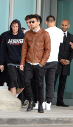 Zayn Malik, Liam Payne and Louis Tomlinson - Leaving Heathrow Airport in London, England - March 2, 2015 - 21xHQ SZdBJIHM